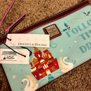 Dooney & Bourke (Disney) Nutracker wristlet.